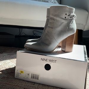 7M light grey booties from Nine West. Gently worn. Cute details: back tie!